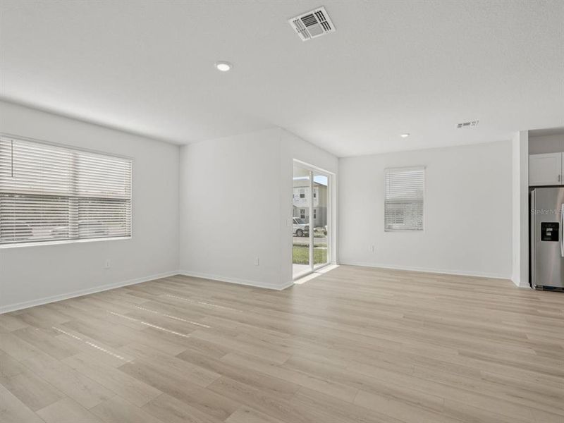 Spacious, unfurnished interior of a new home in Coasterra - Reserve Series, Palmetto (Image 25).