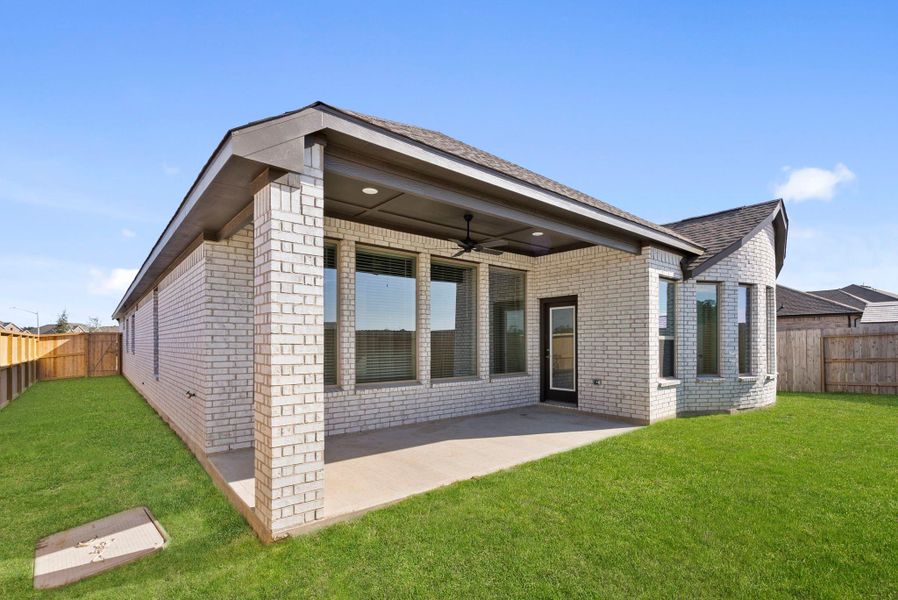 Exterior details and patio area of a home in The Trails 50', New Caney (Image 23).