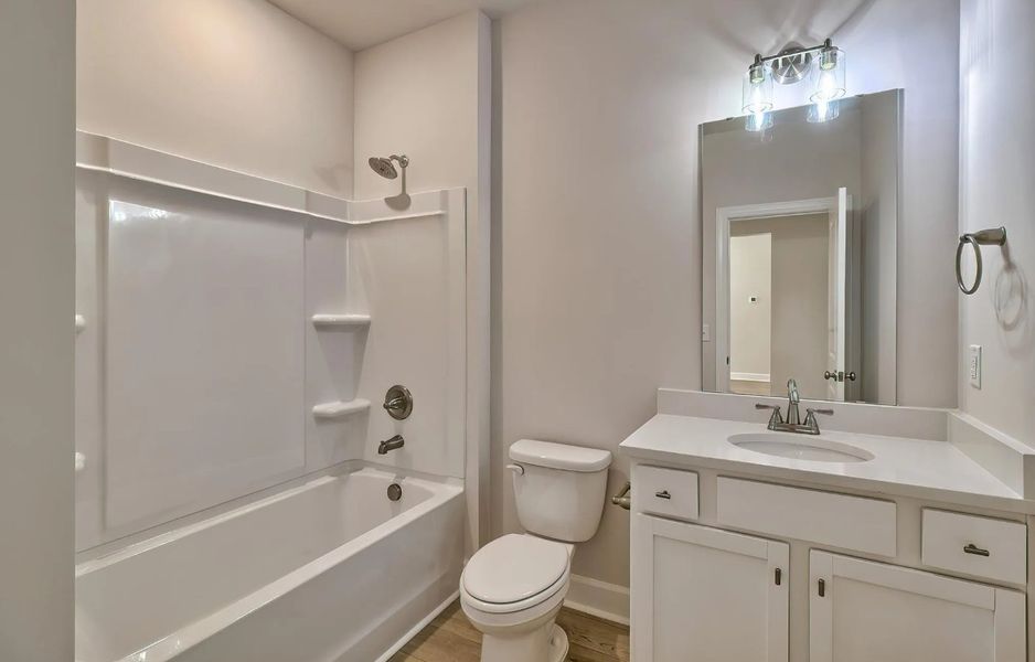 Furnished interior view inside a new home in Satchel Ford, Columbia (Image 11).