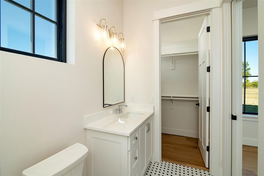 Bathroom with toilet and vanity