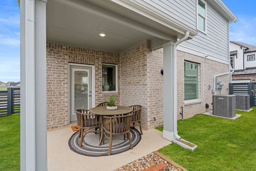 Exterior details and patio area of a home in Bridgeland, Cypress (Image 21). Exterior details and patio area of a home in Bridgeland, Cypress (Image 21).