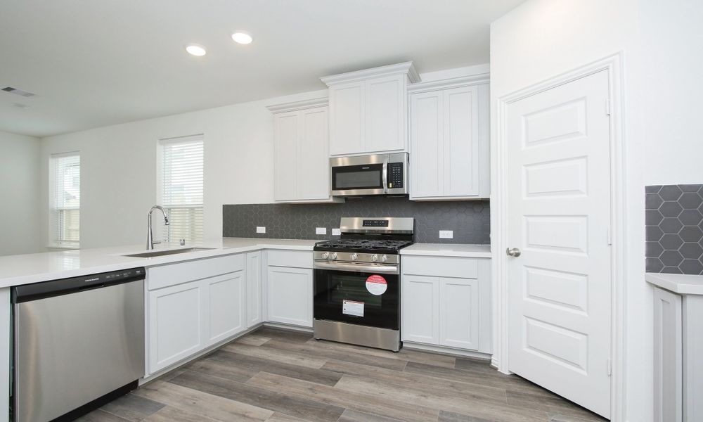 Representative furnished interior of a home built from the Lexington Series - Addison by Brightland Homes in Beamer Villas, Friendswood (Image 12). Representative furnished interior of a home built from the Lexington Series - Addison by Brightland Homes in Beamer Villas, Friendswood (Image 12).