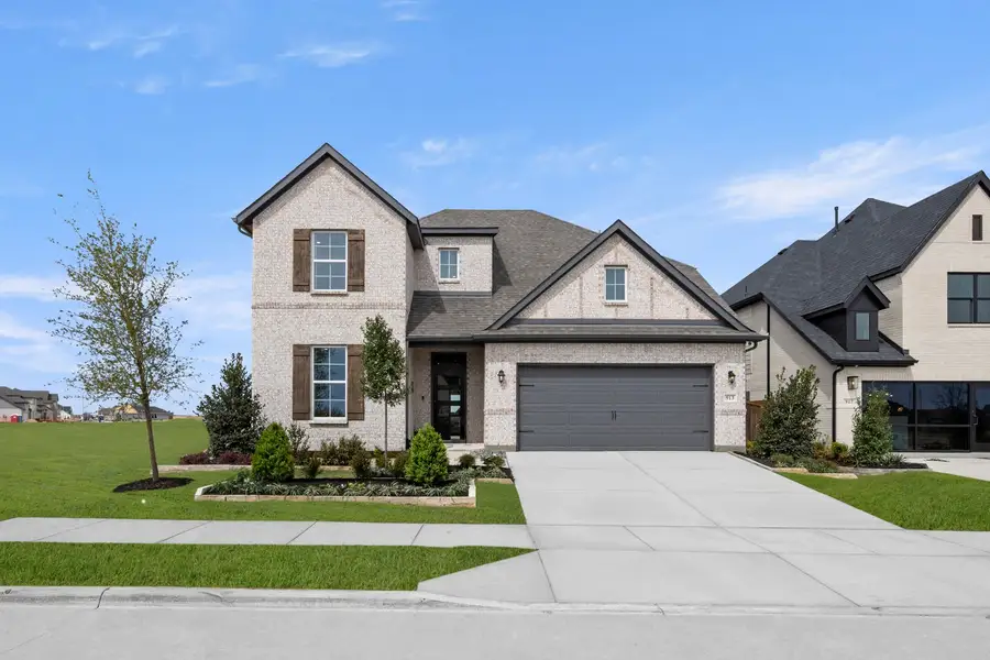 Representative exterior photo of a completed home built from the Hero by Rockwell Homes in Creekside, Royse City, TX (Image 2). Representative exterior photo of a completed home built from the Hero by Rockwell Homes in Creekside, Royse City, TX (Image 2).
