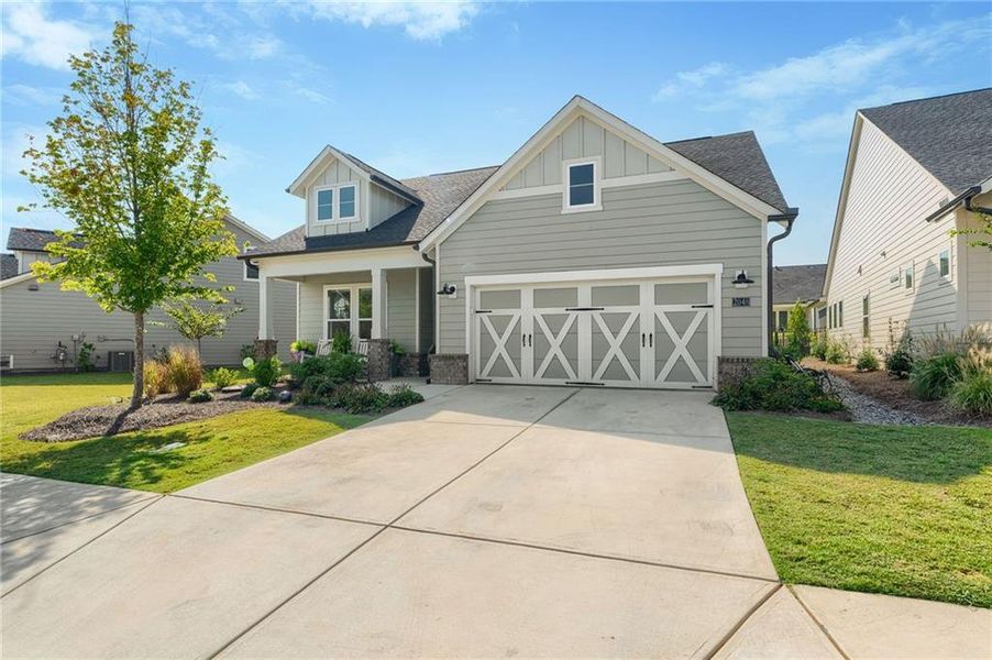 Front exterior of a new home in Crescent Pointe at Great Sky, Canton, GA, highlighting curb appeal (Image 25).