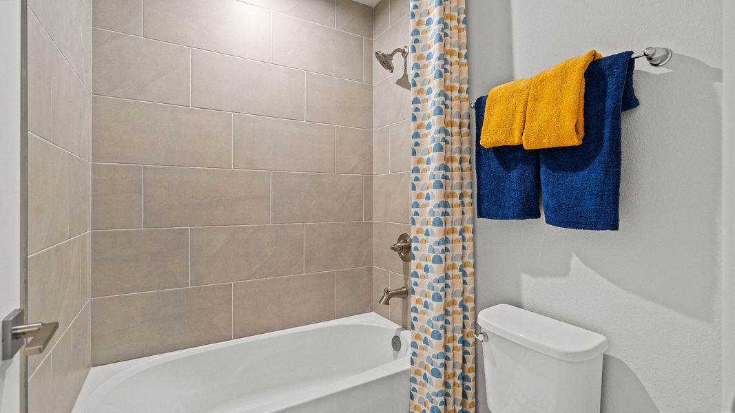 Secondary Bathroom in the Model Highbourne by DRB Homes in Hamilton Bluff located in Haines City, FL. Secondary Bathroom in the Model Highbourne by DRB Homes in Hamilton Bluff located in Haines City, FL.