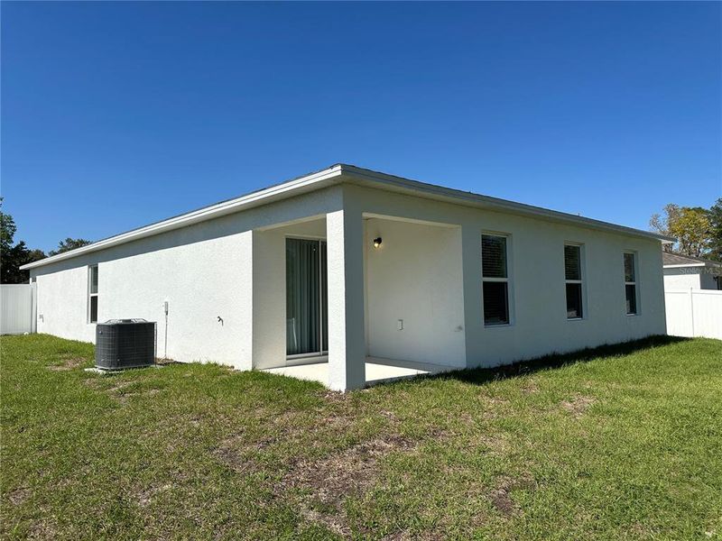 Exterior details and patio area of a home in Marion Oaks, Ocala (Image 30).