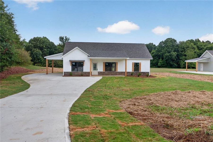 Front exterior of a new home in , Cedartown, GA, highlighting curb appeal (Image 22). Front exterior of a new home in , Cedartown, GA, highlighting curb appeal (Image 22).