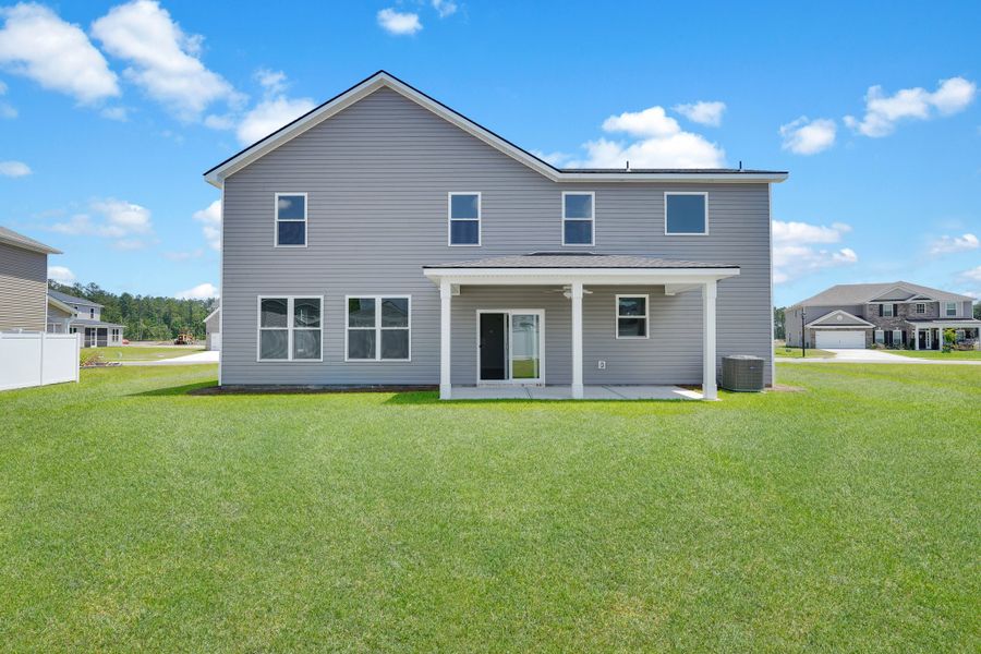 Front exterior of a new home in Camden Crossing, Savannah, GA, highlighting curb appeal (Image 23).