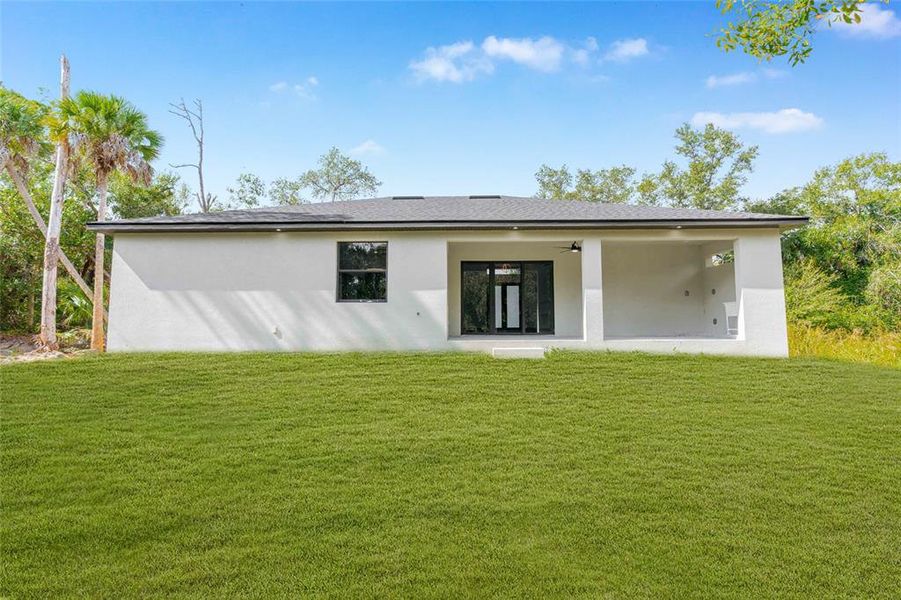 Exterior details and patio area of a home in , Port Charlotte (Image 27).