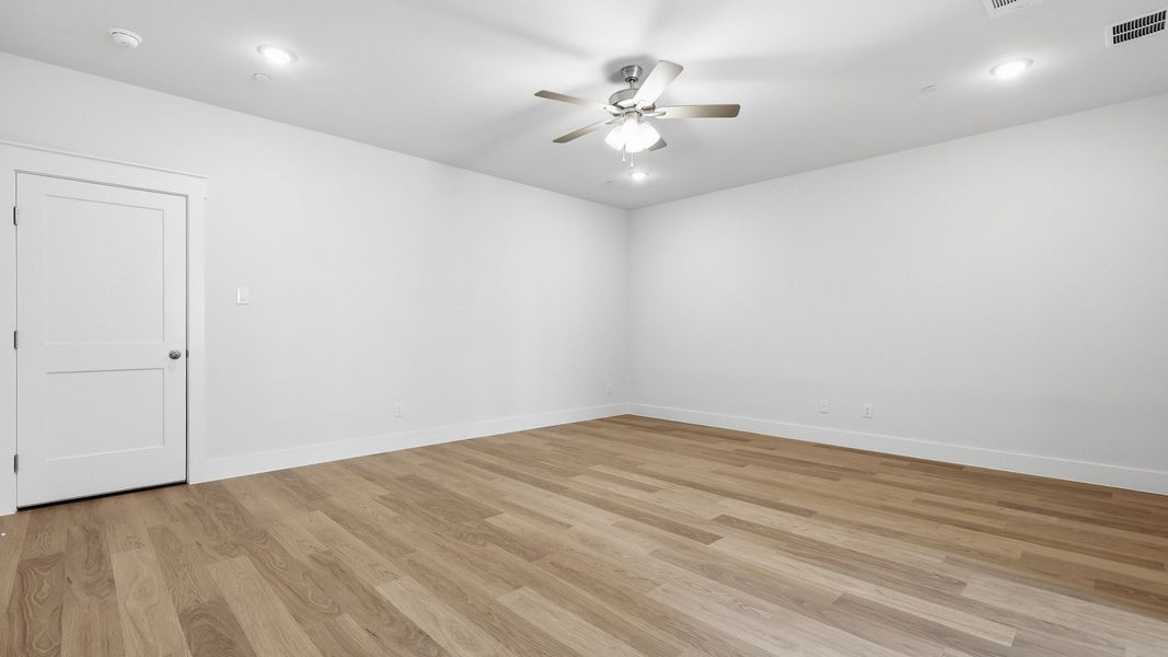 Furnished interior view inside a new home in Collin Creek, Plano (Image 10).