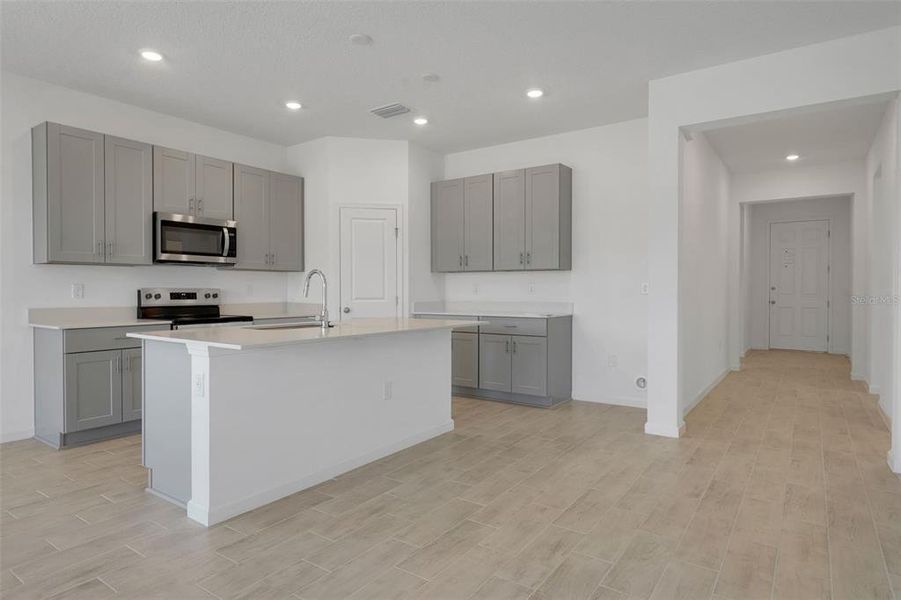 Furnished interior view inside a new home in Willowbrook North, Winter Haven (Image 7).