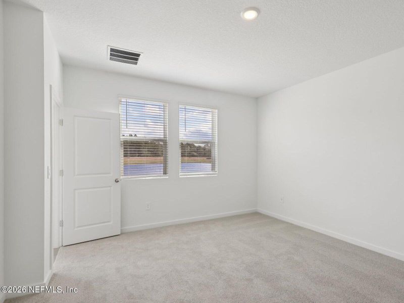 Spacious, unfurnished interior of a new home in Flagler Village - Classic Series, Palm Coast (Image 8). Spacious, unfurnished interior of a new home in Flagler Village - Classic Series, Palm Coast (Image 8).