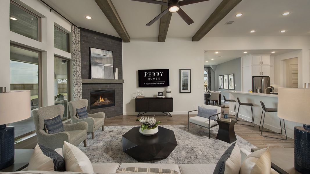 Representative furnished interior of a home built from the 3578W by Perry Homes in Lakes of Cane Island, Katy (Image 6).