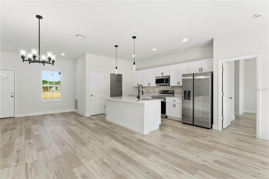 Furnished interior view inside a new home in , Ocala (Image 6).