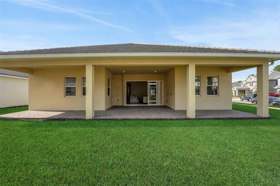 Exterior details and patio area of a home in Palms at Windermere, Windermere (Image 26).