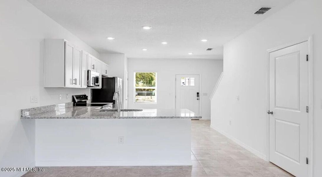 Furnished interior in a model home at Sabal Terrace in Jacksonville (Image 9).