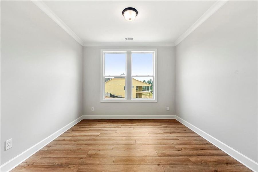 Spacious, unfurnished interior of a new home in Cresswind Georgia at Twin Lakes, Hoschton (Image 12).