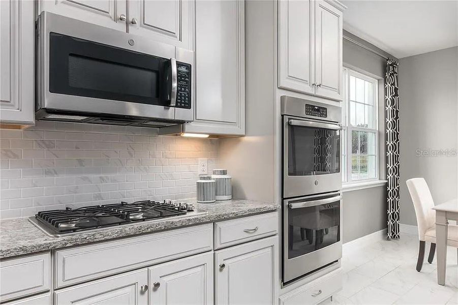 Furnished interior view inside a new home in Parkview Preserve, Apopka (Image 17). Furnished interior view inside a new home in Parkview Preserve, Apopka (Image 17).