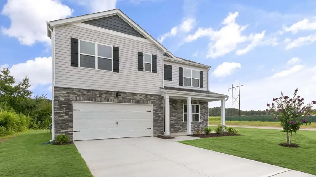 Front exterior of a new home in Villa Grande, Winterville, NC, highlighting curb appeal (Image 2). Front exterior of a new home in Villa Grande, Winterville, NC, highlighting curb appeal (Image 2).