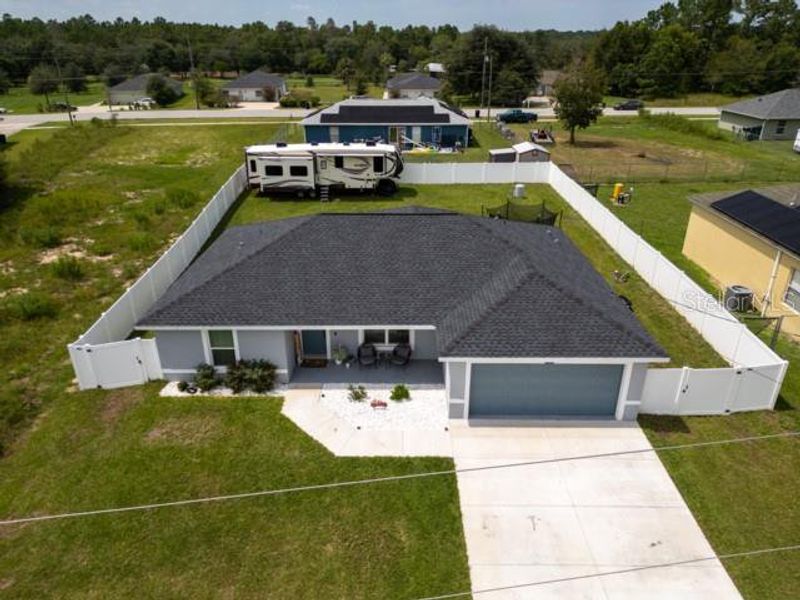 Front exterior of a new home in , Ocala, FL, highlighting curb appeal (Image 24).