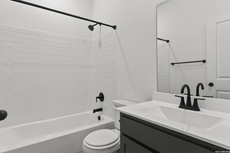 Furnished interior view inside a new home in Hennersby Hollow, San Antonio (Image 12).
