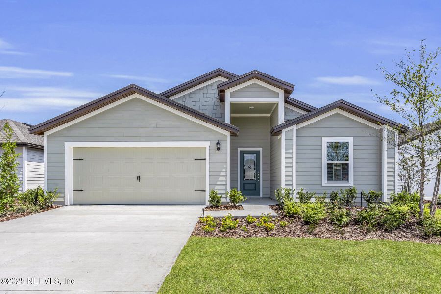 Front exterior of a new home in Rolling Hills, Green Cove Springs, FL, highlighting curb appeal (Image 2).