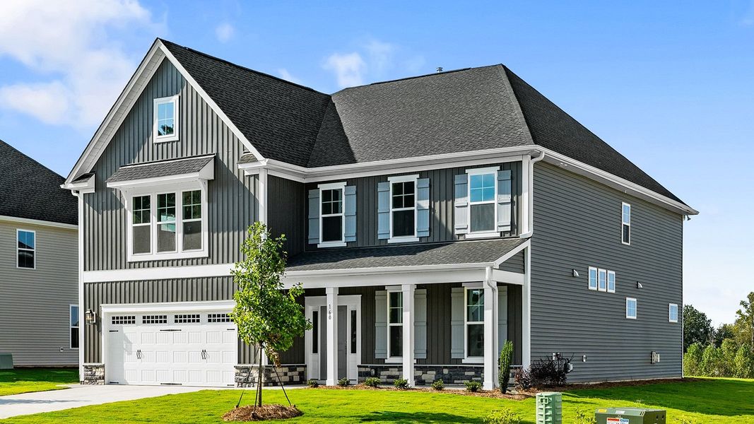 Front exterior of a new home in Fieldstone, Lexington, NC, highlighting curb appeal (Image 2).