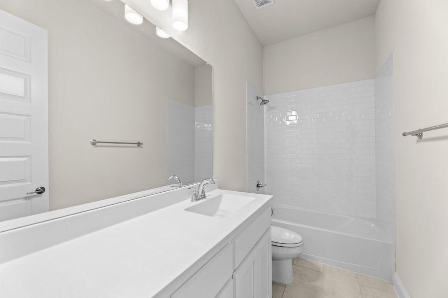 Representative furnished interior of a home built from the Wildwood SE by Sandlin Homes in Settler's Glen, New Fairview (Image 15).