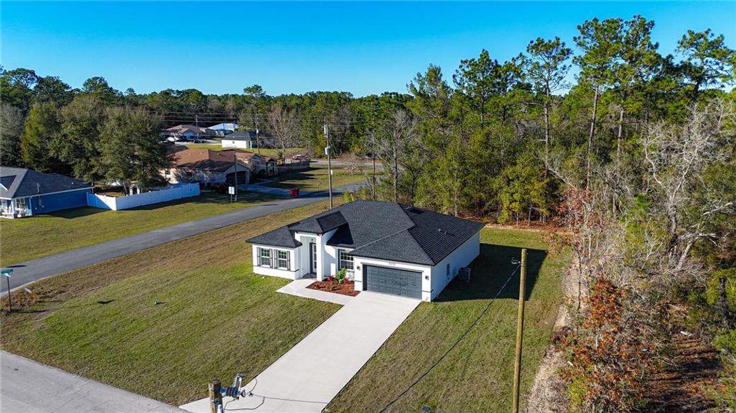 Front exterior of a new home in , Citrus Springs, FL, highlighting curb appeal (Image 22).