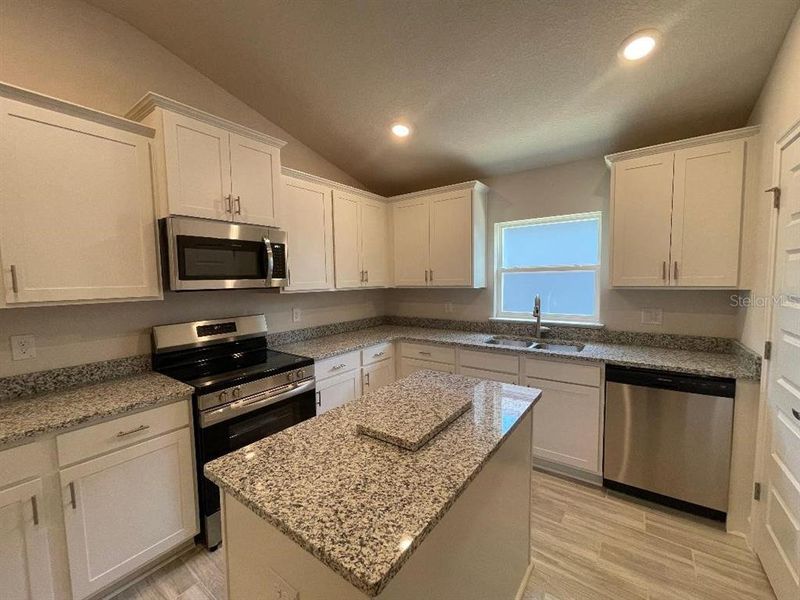 Furnished interior view inside a new home in Abbey Glen, Dade City (Image 4).