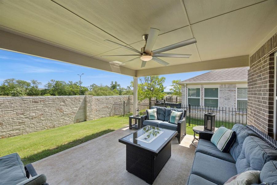 The home has wrought iron fencing to separate the property from the neighbors.
