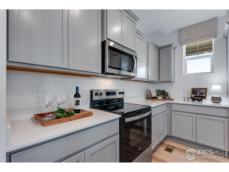 Furnished interior view inside a new home in Vista Meadows, Fort Lupton (Image 40).
