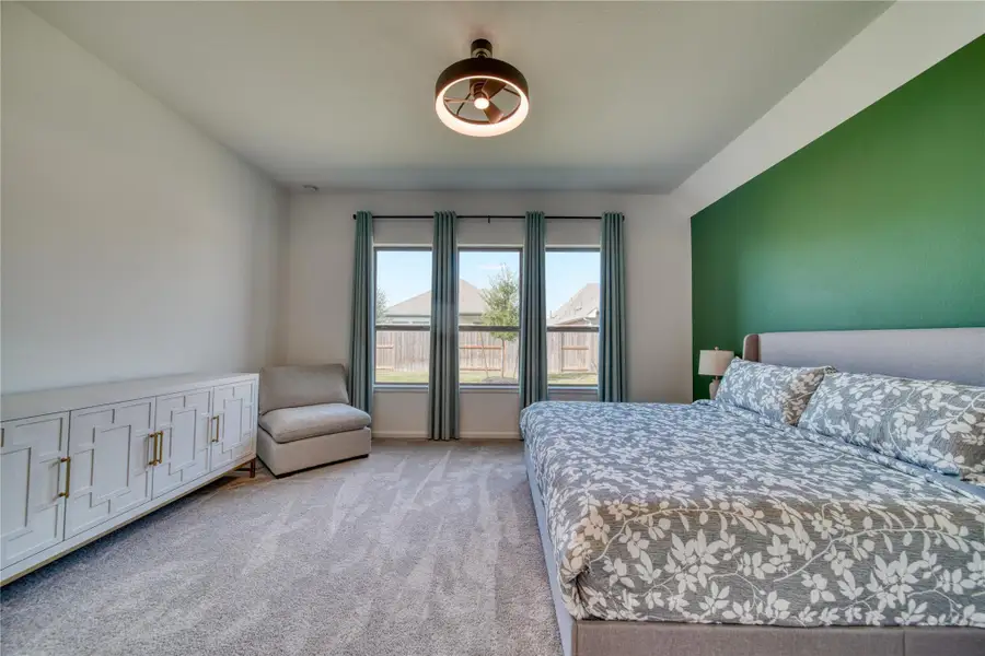 Furnished interior view inside a new home in Meridiana 40'/45', Manvel (Image 8).