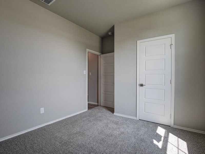 Representative unfurnished interior of a home built from the The Asheville E by Davidson Homes LLC in Hannah Heights, Seguin (Image 23). Representative unfurnished interior of a home built from the The Asheville E by Davidson Homes LLC in Hannah Heights, Seguin (Image 23).