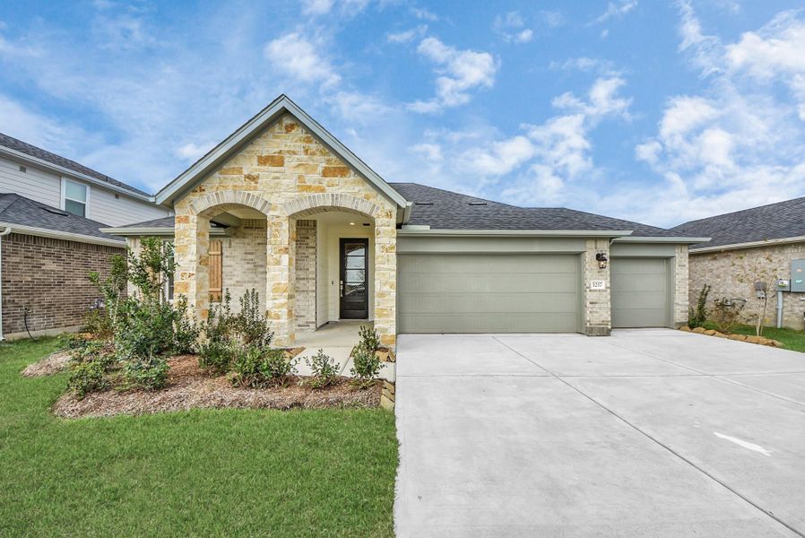 Front exterior of a new home in Sunrise Cove: Landmark Collection, Texas City, TX, highlighting curb appeal (Image 19).