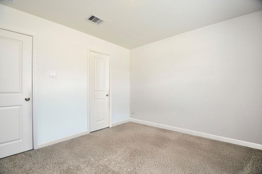 Large bedroom with great closet space.