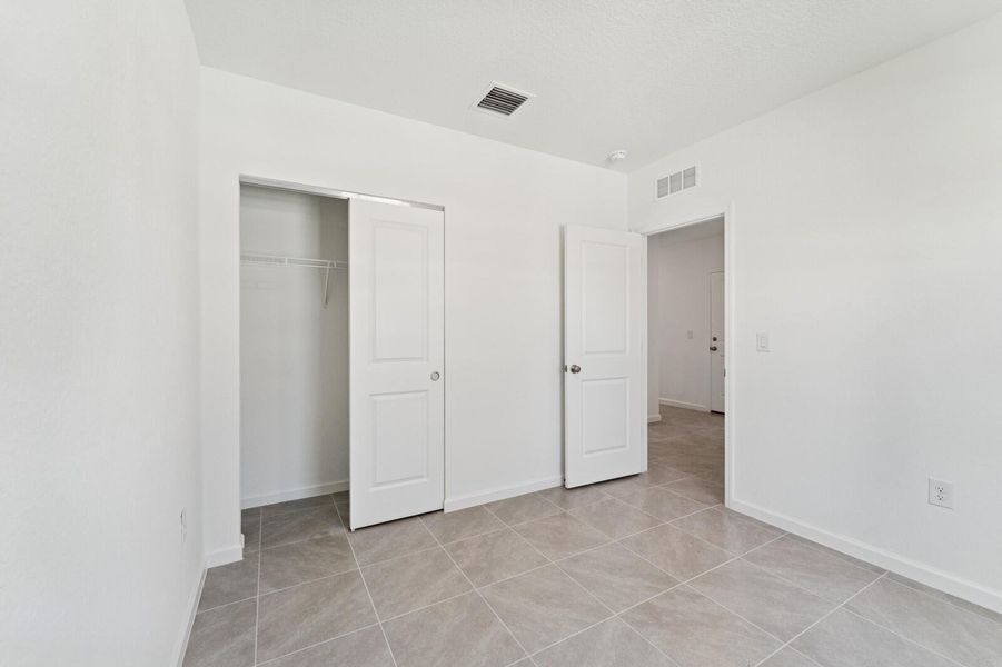 Spacious, unfurnished interior of a new home in Aspire at Port St. Lucie, Port St. Lucie (Image 24).