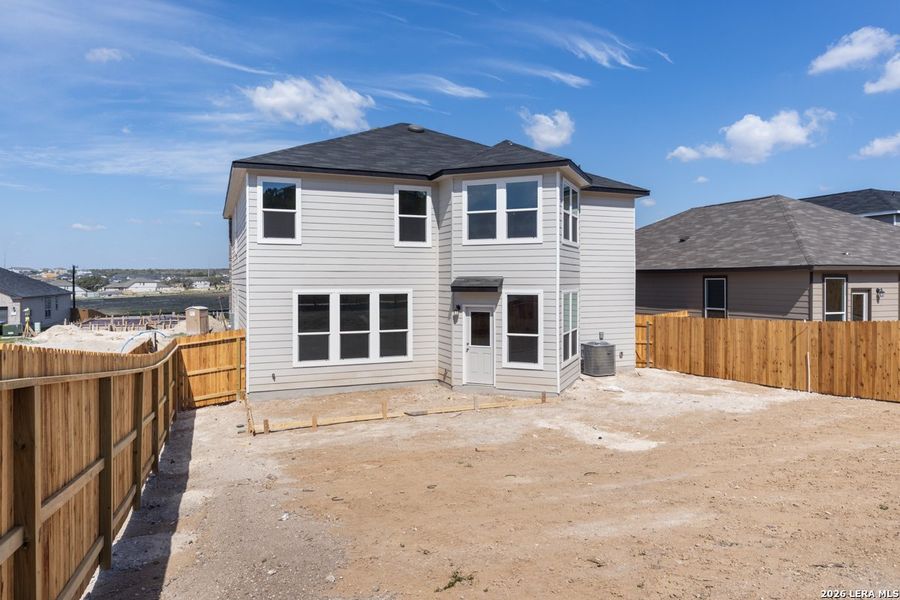 Exterior details and patio area of a home in Hidden Bluffs at TRP, San Antonio (Image 4).