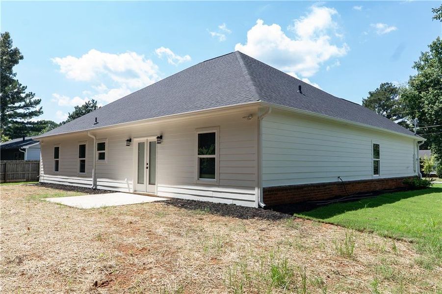 Front exterior of a new home in , Lithonia, GA, highlighting curb appeal (Image 2).
