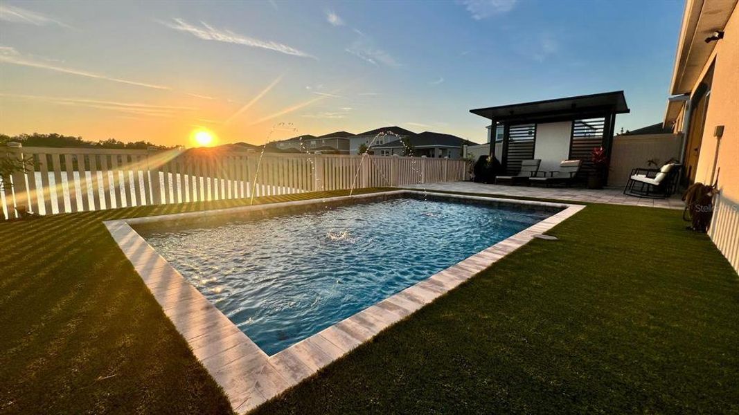 Exterior details and patio area of a home in Seasons at Big Sky, Kissimmee (Image 15).