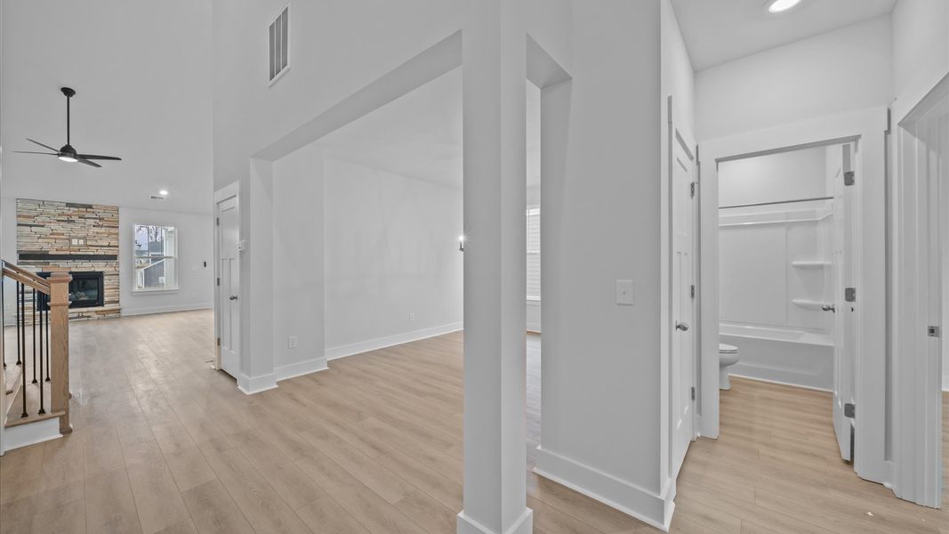 Exceptional foyer with warm hardwood flooring and refined finishes throughout Exceptional foyer with warm hardwood flooring and refined finishes throughout