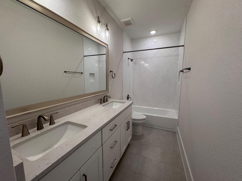 Furnished interior view inside a new home in Easthaven at Bridgeland Central - Vision Collection, Cypress (Image 8). Furnished interior view inside a new home in Easthaven at Bridgeland Central - Vision Collection, Cypress (Image 8).