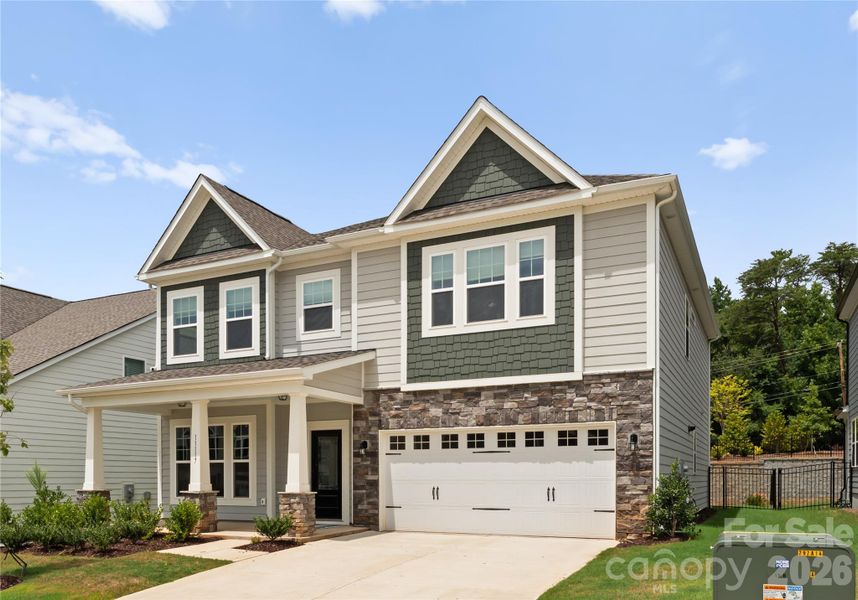 Front exterior of a new home in Avienmore, Charlotte, NC, highlighting curb appeal (Image 2). Front exterior of a new home in Avienmore, Charlotte, NC, highlighting curb appeal (Image 2).