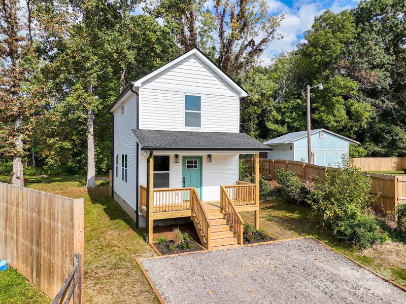 Front exterior of a new home in , Marion, NC, highlighting curb appeal (Image 18).