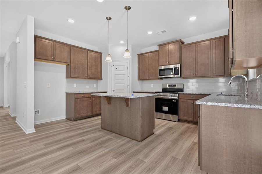 Furnished interior view inside a new home in Summerfield Place, Carrollton (Image 13).