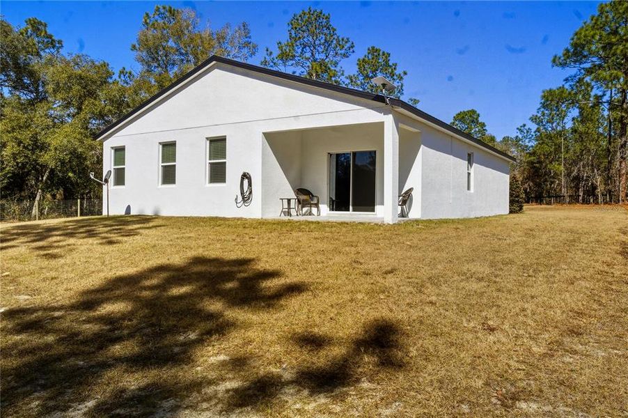 Exterior details and patio area of a home in , Ocala (Image 4).
