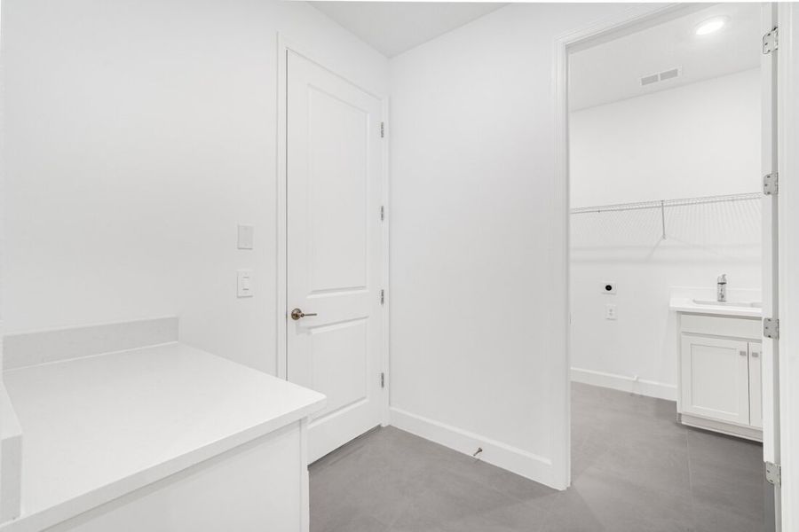 Representative furnished interior of a home built from the Saint Clair by Taylor Morrison in Harvest at Ovation, Winter Garden (Image 11).