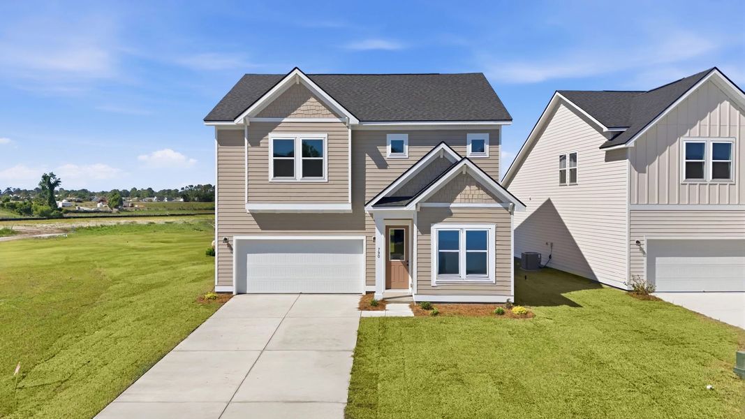Representative exterior photo of a completed home built from the Cyprus by Ashton Woods in Blue Heron Retreat, Little River, SC (Image 1). Representative exterior photo of a completed home built from the Cyprus by Ashton Woods in Blue Heron Retreat, Little River, SC (Image 1).