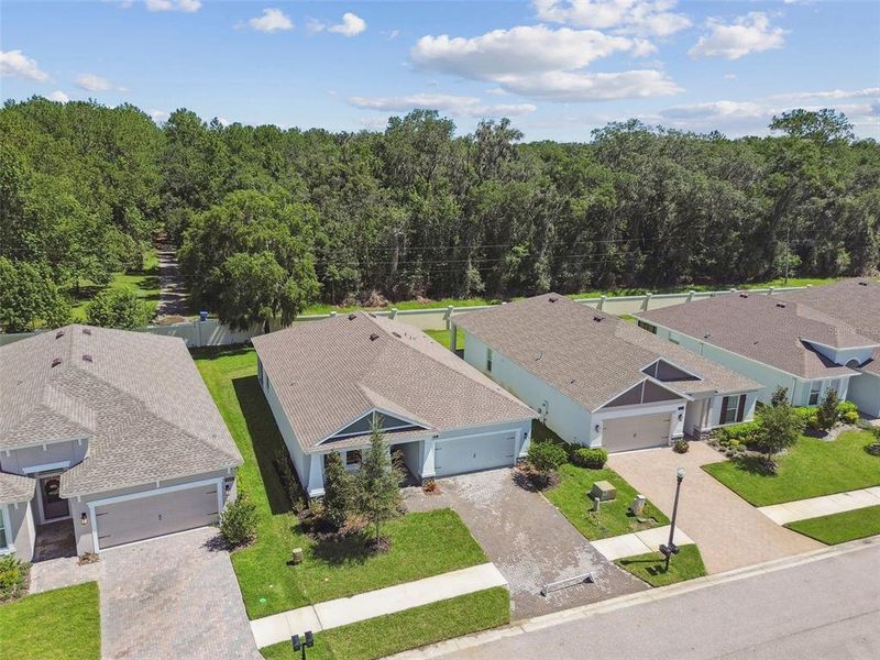 Front exterior of a new home in Cascades at Southern Hills, Brooksville, FL, highlighting curb appeal (Image 26).