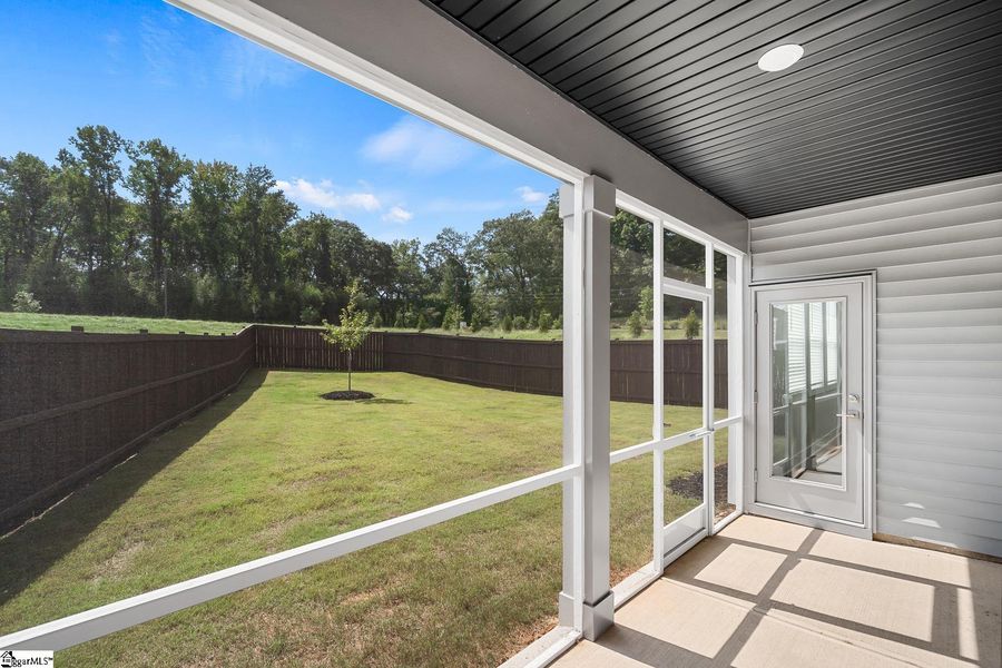 Exterior details and patio area of a home in Saratoga Oaks, Williamston (Image 4).